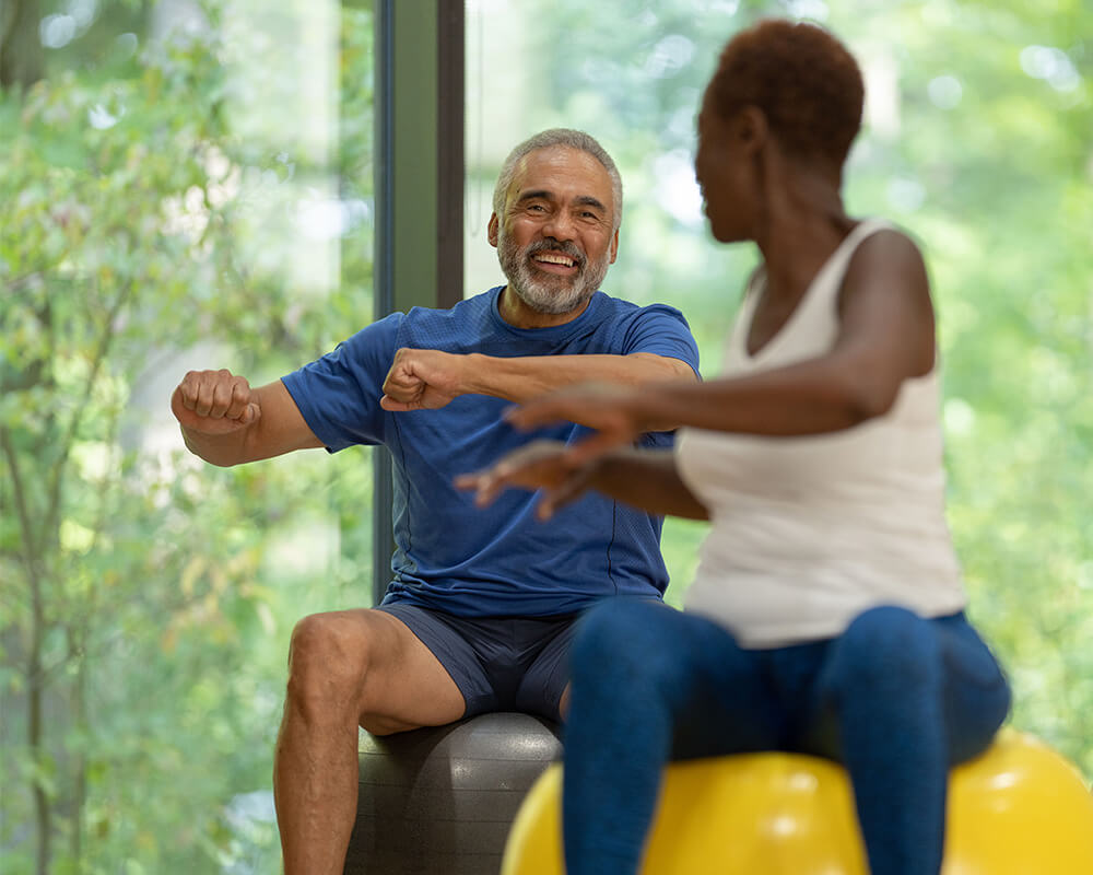 Seniors enjoy a workout class